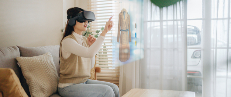 A woman sitting on a couch with virtual reality headset image text